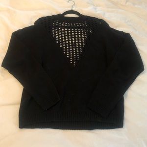 MIKA + GALA black backless sweater.